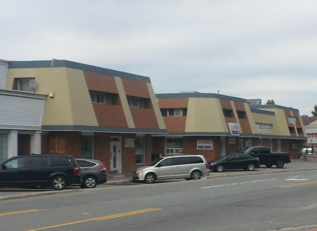 Main East Court Apartments exterior on Main Street East in Huntsville, Ontario